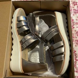 Brand new, never worn Clark’s Jillian Nina Pewter Metallic Wedge Sandals
